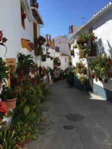 Small winding roads with flowers in Canillas, Spain. Beautiful atmosphere
